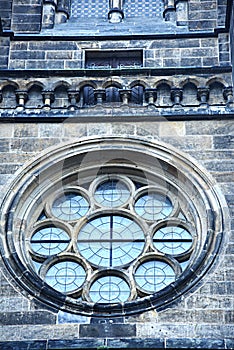 Gothic cafedral church circle window in rainy day