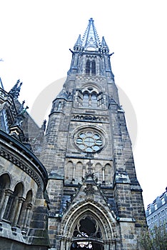 Gothic cafedral church tower in rainy day