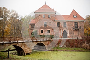 Gothic castle in Oporow, Poland photo