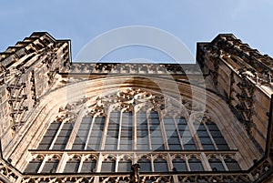 Gothic cathedral front sandstone facade, large windows