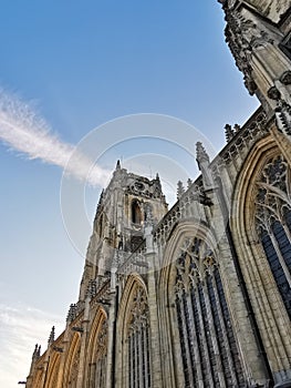 Gothic church Basilica of our Lady at the main square in Tongeren, Belgium, at sunset with a clear blue sky