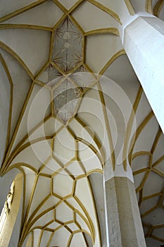 Gothic columns inside the old medieval saxon lutheran church in Sighisoara, Transylvania, Romania