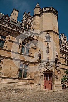 Gothic facade of the Cluny Museum, with a rich collection of medieval art artifacts in Paris.