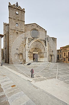 Gothic facade church and square. Castello de Empuries. Catalonia, Spain photo