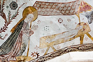 Gothic fresco of Mary and the Christ child in the stable