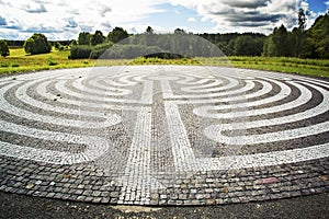 Gothic labyrinth from black and white cobble-stones