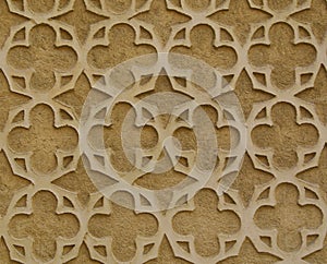 Gothic ornament made of gypsum on stone wall in Segovia, Spain