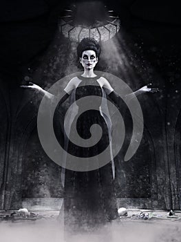 Gothic sorceress in an old crypt photo