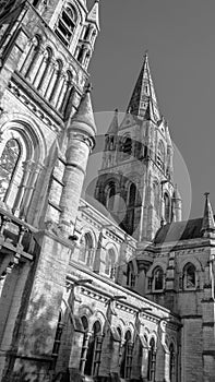 The Gothic spire of an Anglican church in Cork, Ireland. Neo-Gothic Christian religious architecture. Cathedral Church of St Fin