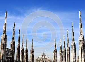 Gothic spires on blue sky background
