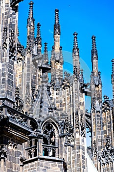 Gothic Spires and Intricate Stonework Against Blue Sky