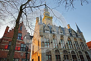 The gothic Stadhuis town hall with its impressive clock tower, located at the main square Markt in Veere