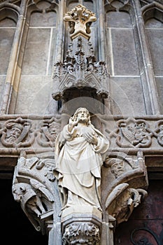 Gothic statue of Jesus on portal to Basilica Minor of Saint Benedict in Hronsky Benadik