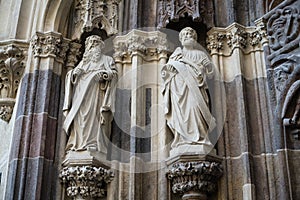 Gothic statues on portal to Basilica Minor of Saint Benedict in Hronsky Benadik