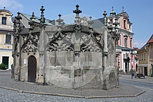 Gothic stone fountain in Kutna Hora photo