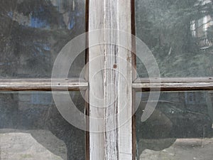 Gothic style cross. Christian cross in the window. Abstract cross in church interior