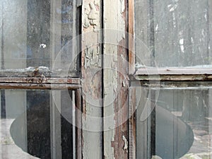 Gothic style cross. Christian cross in the window. Abstract cross in church interior