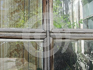 Gothic style cross. Christian cross in the window. Abstract cross in church interior