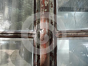 Gothic style cross. Christian cross in the window. Abstract cross in church interior