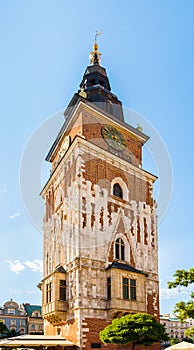 Gothic town hall tower with clock in Cracow, Poland