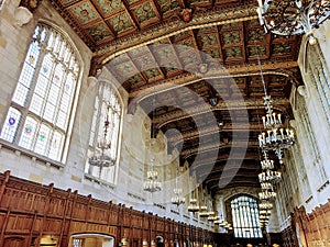 Gothic University Hall with Stained Glass and Carved Ceiling