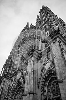 Gothic Vysehrad cathedral in Prague with beautiful stone statues in black and white