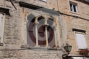 Gothic windows of the fifteenth-century Stafileo palace in Trogir Croatia.