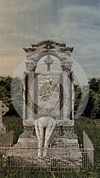 Gotic tombstone in old cemetery