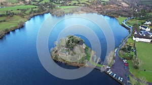 Gougane Barra, County Cork, Ireland, where water flows gracefully around a historic chapel