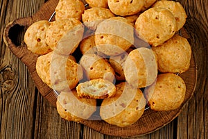 Gougeres on wooden background