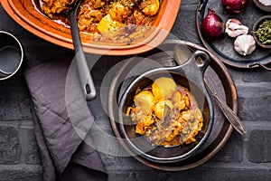 Goulash with potatoes and sauerkraut. Beef and vegetable stew in clay pot