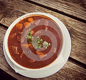 Goulash soup at beer garden, traditional Bavarian food