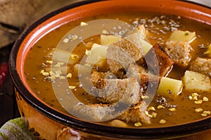 Goulash soup with croutons and potatoes