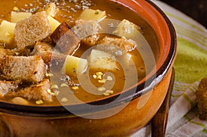 Goulash soup with croutons and potatoes