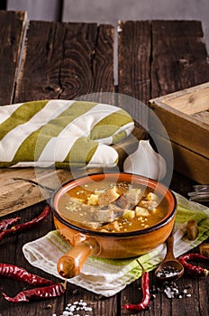 Goulash soup with croutons and potatoes