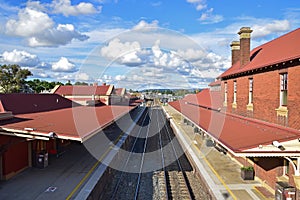 Goulburn train railway station with waiting area and rail track