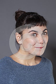 Gourmand young woman with a cheerful smile photo