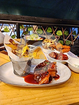 Gourmet barbecue-style dishes with side dishes