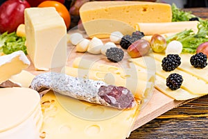 Gourmet Cheese Board with Cured Meat and Fruit