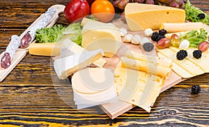 Gourmet Cheese Board on Rustic Wooden Table