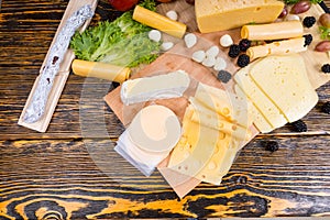 Gourmet Cheese Board on Rustic Wooden Table