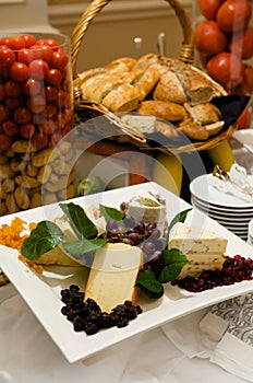 Gourmet cheese plate with garnishes