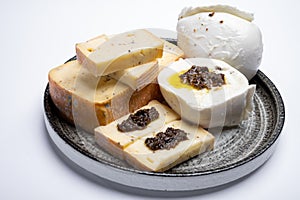 Gourmet cheeses, italian taleggio and mozzarella chesses with filling from black truffles mushrooms