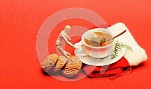 Gourmet delicious taste. Cafe restaurant menu. Cup of tea on red background close up. Herbal or green tea. Ceramic cup