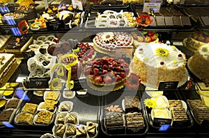 Gourmet desserts in grocery store photo