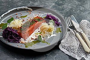 Gourmet dish. Smoked salmon with vegetables. Salmon dish for restaurant