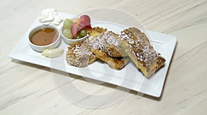 Gourmet french toast breakfast with fruit