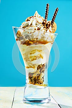 Gourmet fresh mixed nut sundae with whipped cream