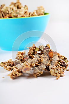 Gourmet granola in blue bowl vertical