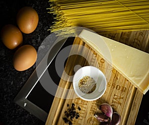 gourmet italian pasta spaghetti carbonara with eggs parmesano cheese photo